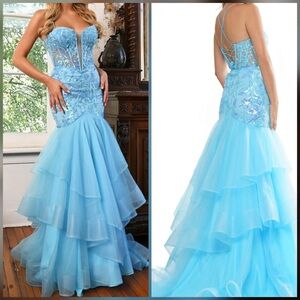 Light blue mermaid prom dress with lace up corset back and tiered ruffle skirt